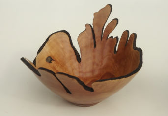 Turned natural edge Myrtle bowl with pyrographed rim