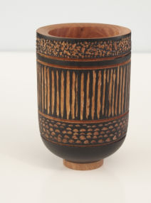 Turned wooden bowl carved and dyed 